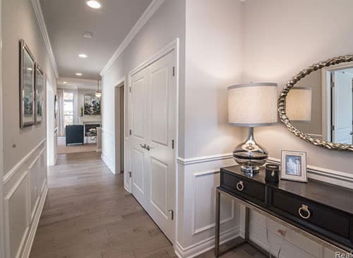 a kitchen with an island in the middle of a room