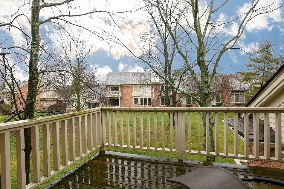 a building with a wooden fence